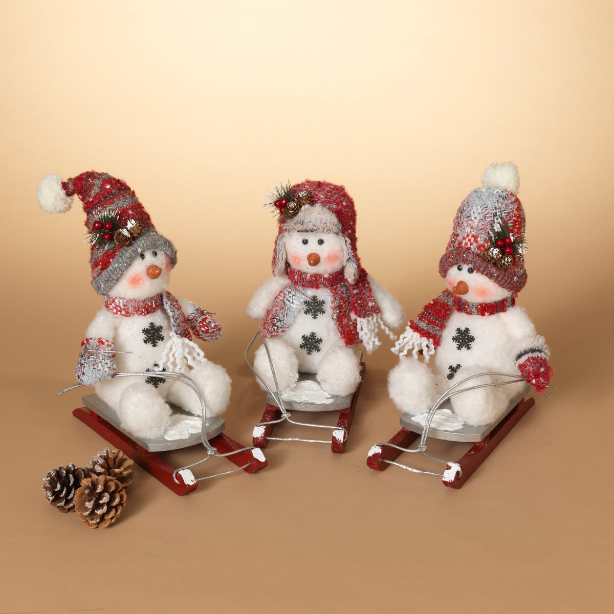 11"H Plush Holiday Snowmen on Sled