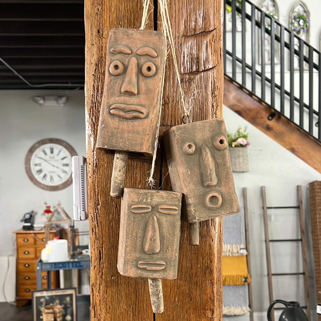 CLAY FACE HANGING BELLS
