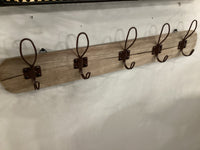 Coat rack with rustic hooks